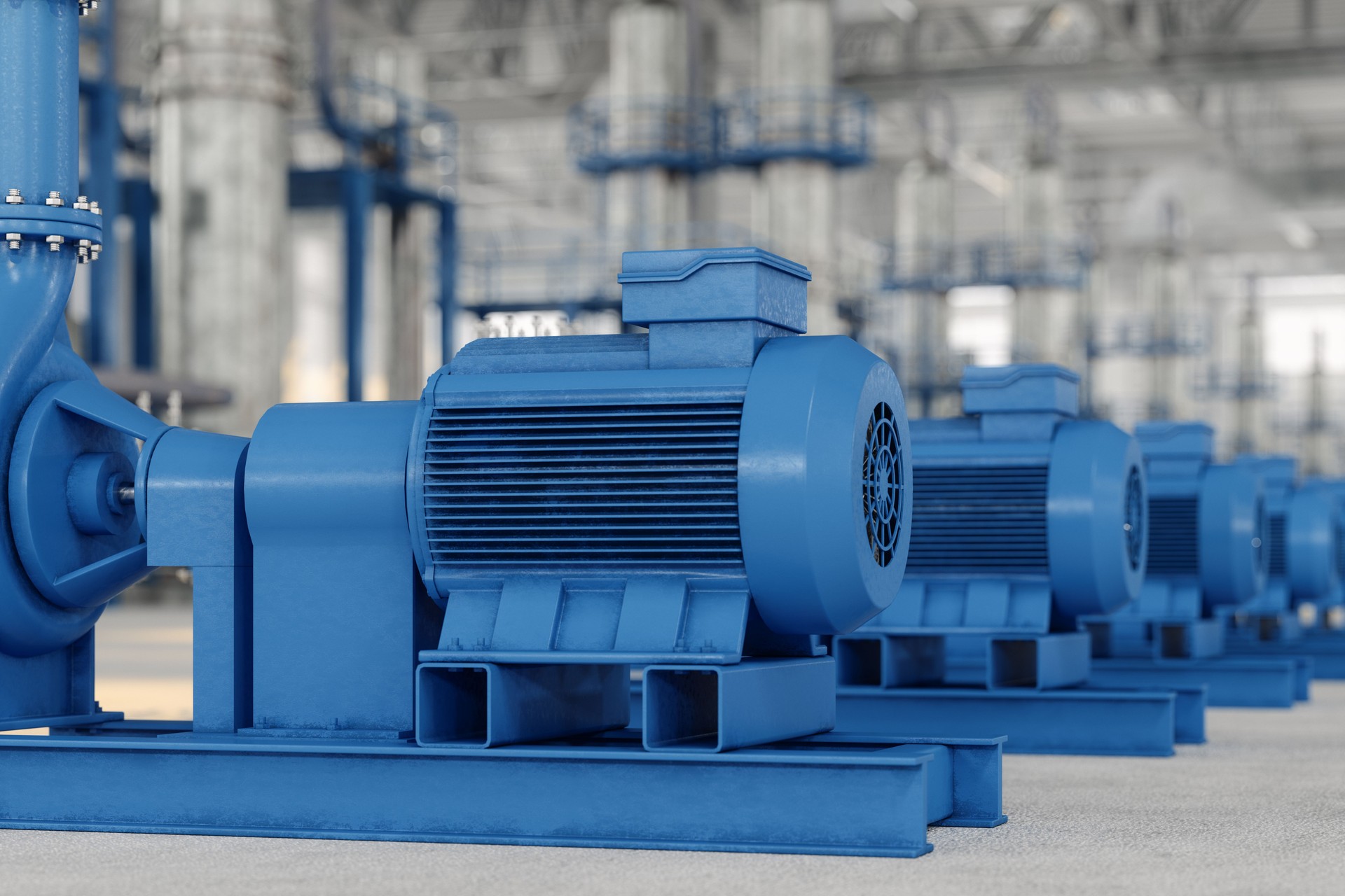 Primer plano de motores eléctricos con bombas en planta
